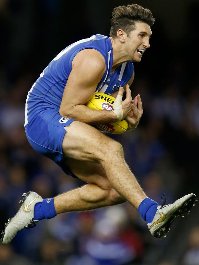 Kangaroo forward Jarrad Waite marks.