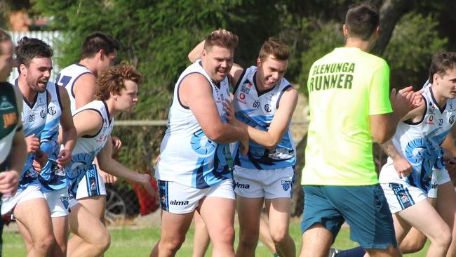 Michael Wundke is congratulated by teammates after kicking a goal for Glenunga during its win over Seaton Ramblers on Saturday. Picture: Max Stapleton