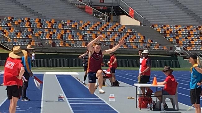 Joshua Cowley at the long jump pit while at Brisbane State High School.