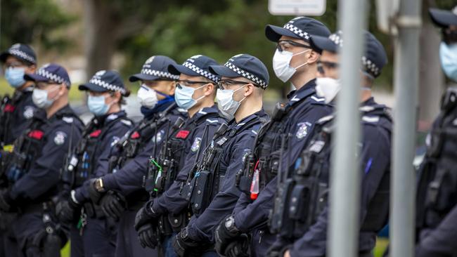 Police on guard at a Flemington public housing tower. Picture: Tim Carrafa