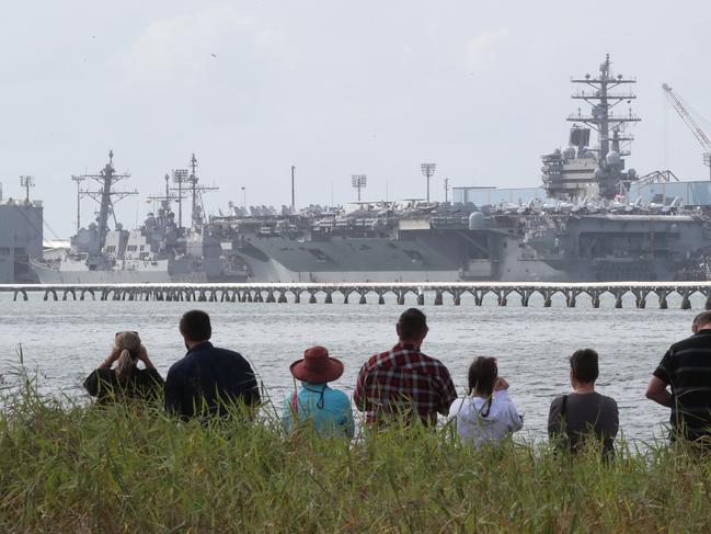 People gather at Myrtletown Reserve to have a look at the USS Ronald Reagan. Picture: Peter Wallis