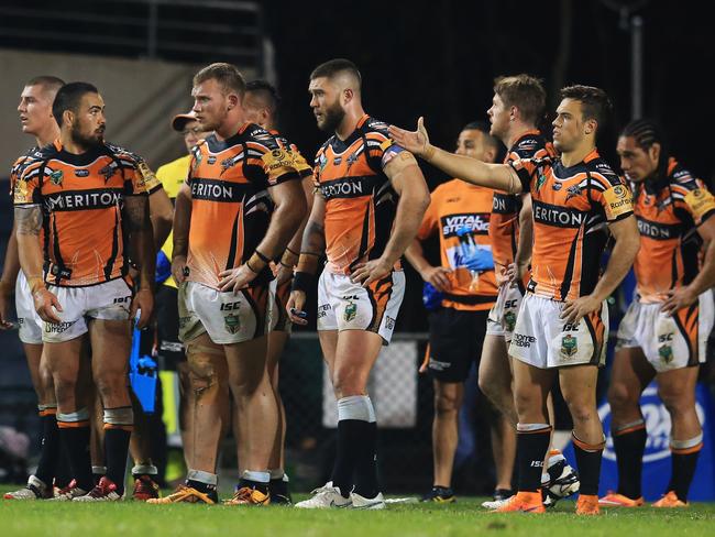 Tigers players watch on after conceding the only try of the game against the Cowboys at Campbelltown Stadium. Picture: Mark Evans