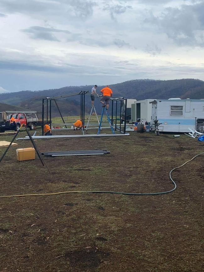 A group of tradies, including Mornington Peninsula carpenter Robert Johnstone, have been balancing their full-time jobs with volunteering to help the fire clean-up. Picture: Supplied