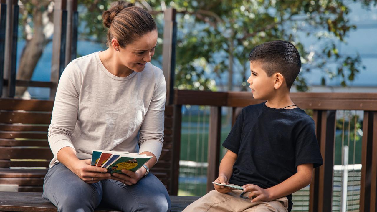 Leonel Molina, 7, interviews Ash Barty about her Little Ash books. Picture: Nic Morley