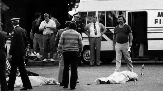 Bodies lie outside the Viking Tavern at Milperra.