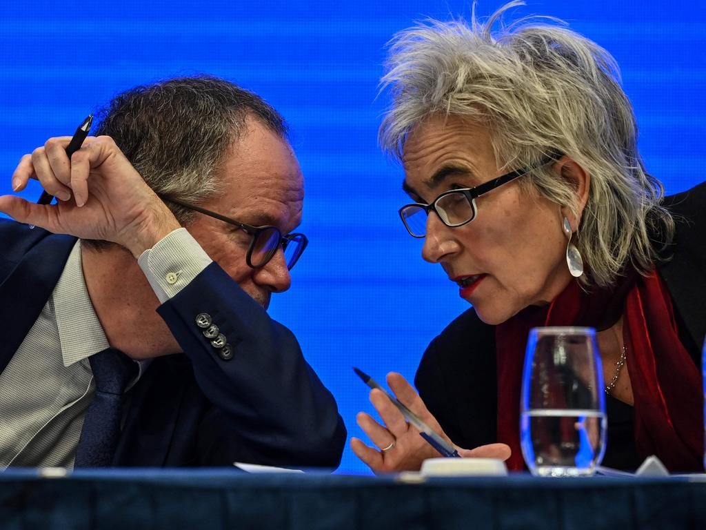 Peter Ben Embarek (L) and Marion Koopmans (R) who said the WHO Wuhan report is “a good start”. Picture: AFP