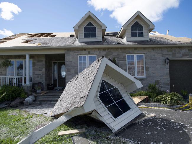 A dormer that was torn from a home's roof by a tornado is seen in Dunrobin, Ontario, Canada west of Ottawa. Picture: Justin Tang/The Canadian Press via AP