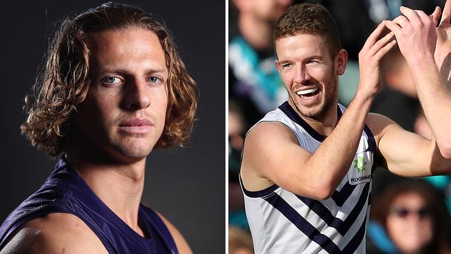 Fremantle captain Nat Fyfe (left) and small forward Sam Switkowski, who has been cleared of coronavirus after being tested.