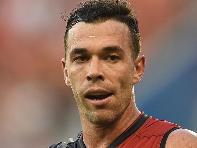 GOLD COAST, QUEENSLAND - MARCH 26:  Ryan Crowley of the Bombers looks dejected during the round one AFL match between the Gold Coast Suns and the Essendon Bombers at Metricon Stadium on March 26, 2016 in Gold Coast, Australia.  (Photo by Matt Roberts/AFL Media/Getty Images)