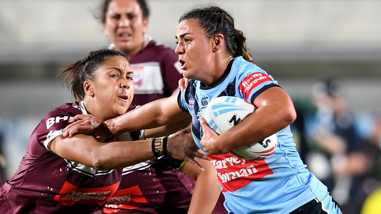 The Maroons defence closes in on NSW’s Millie Boyle.