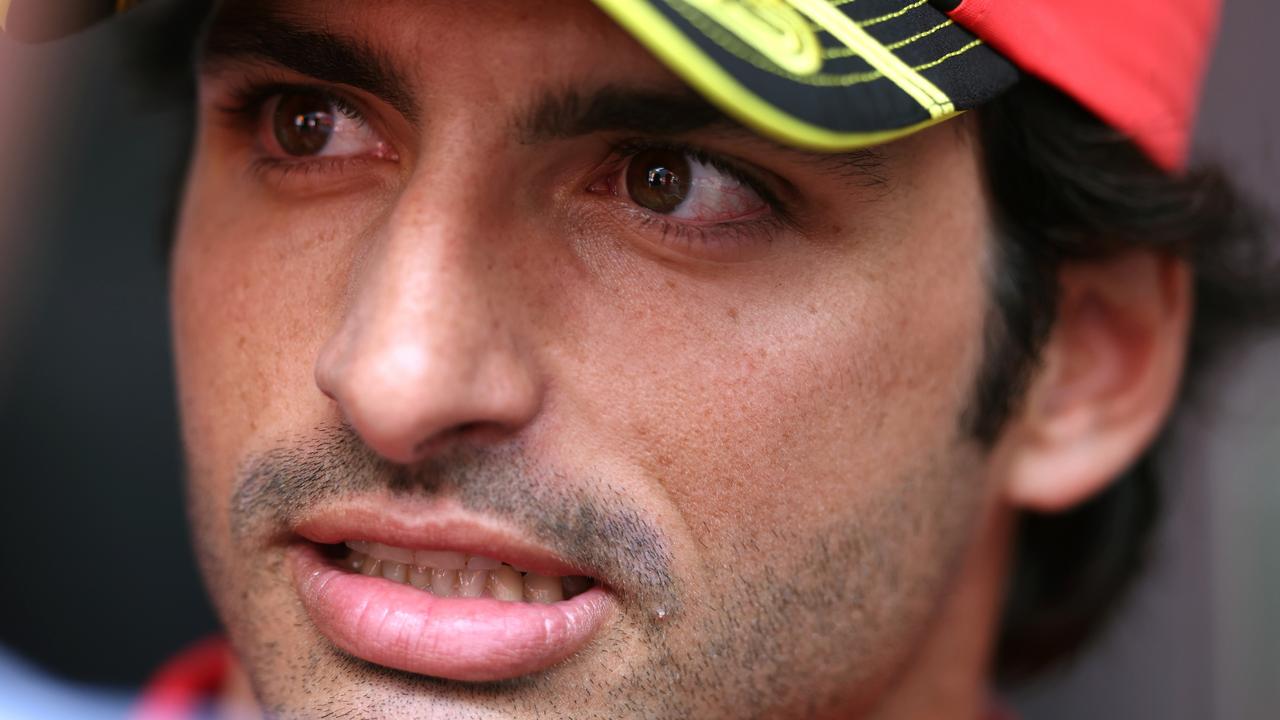 MONZA, ITALY - AUGUST 31: Carlos Sainz of Spain and Ferrari talks to the media in the Paddock during previews ahead of the F1 Grand Prix of Italy at Autodromo Nazionale Monza on August 31, 2023 in Monza, Italy. (Photo by Ryan Pierse/Getty Images)