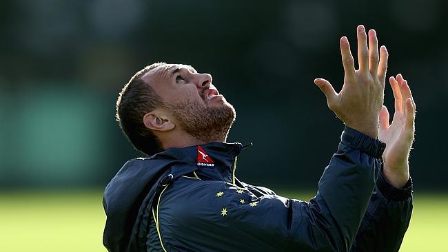 Quade Cooper watches a kick during a Wallabies training session in London this week.