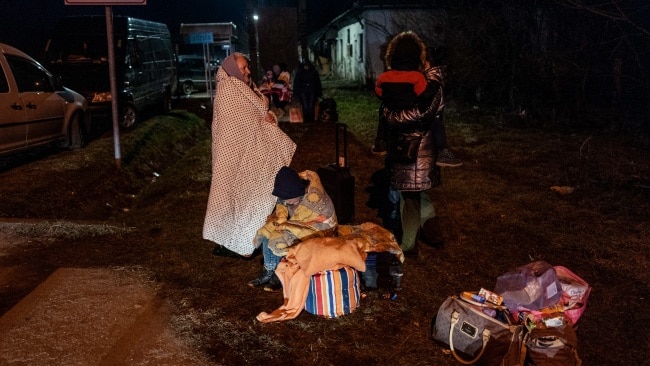 Meanwhile, hundreds of thousands of citizens, mainly women and children, were queuing at neighbouring borders. Picture: Getty Images