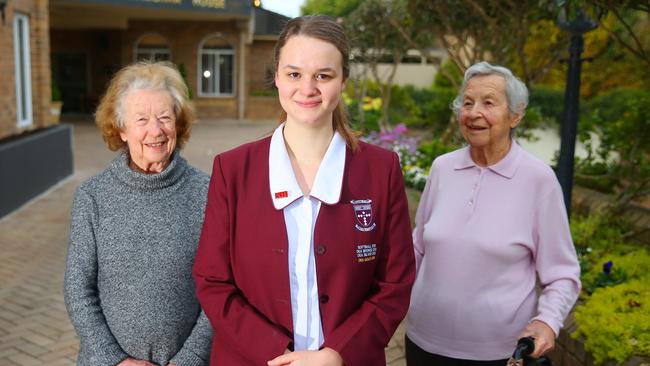 Residents Barbara and Ursel with Rosie. Rosie Spurr, year 12 student of Brigidine College, won the Lion's award for her volunteer work with aged care centre residents of Turramurra House.