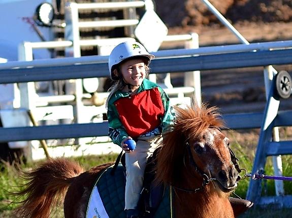 Georgia Rose Johnson having fun during the Charters Towers and District Pony Club fun and games rally afternoon.