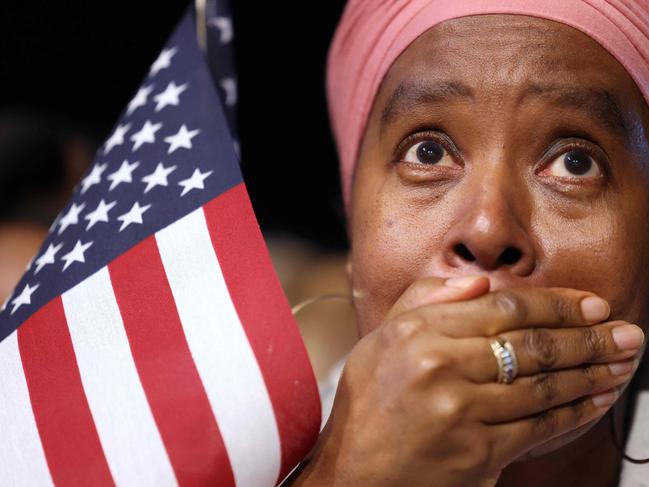 TOPSHOT - A supporter of US Vice President and Democratic presidential candidate Kamala Harris reacts during an election night event at Howard University in Washington, DC, on November 5, 2024. (Photo by CHARLY TRIBALLEAU / AFP)