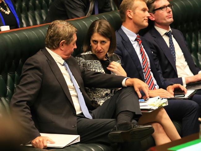 Premier Gladys Berejiklian speak to MP Ray Williams in parliament yesterday, a day before the donations story broke. Picture: Adam Taylor