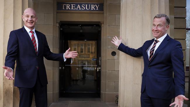 Former Treasurer Peter Gutwein and former Premier Will Hodgman in front to the Treasury Building in 2018 during a previous sale attempt. Neither subsequently became real estate salesmen. Picture: RICHARD JUPE