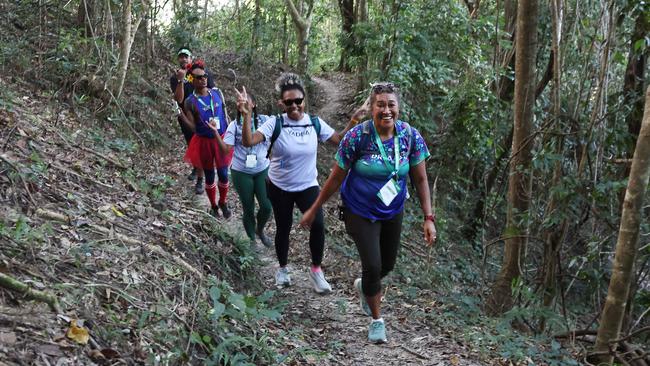 114 walkers and runners have raised more than $20,000 for the Far North Queensland Hospital Foundation in this year's BDO Arrow Experience, running and walking the arrow tracks on Mt Whitfield for charity. The proceeds from this year's event will go towards the purchase of a new surgical robot for the Cairns Hospital. Kami Radrodro, Maika Qalulu, Betty Tawake (obscured), Vanessa Tawake and Maureen Bolawaqatabu took on the long course together, walking the green, blue, red then yellow arrow tails in succession on Saturday morning. Picture: Brendan Radke