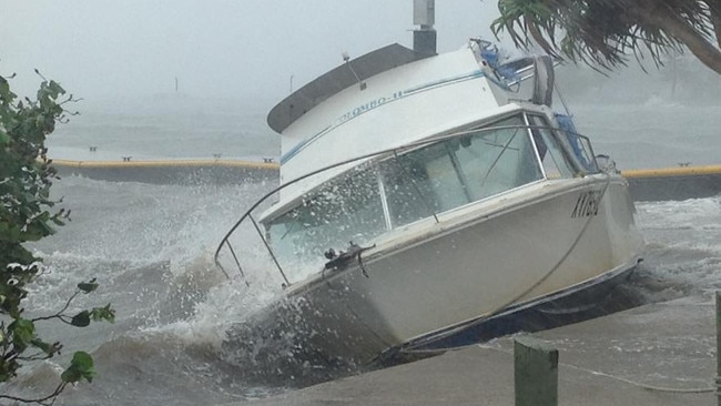 Wild weather hits the Sunshine Coast as the weather system remaining from ex-tropical cyclone Oswald moves south. Wind batters a boat at the boat ramp next to Caloundra Power Boat Club, Golden Beach. Picture: Barb Blewitt