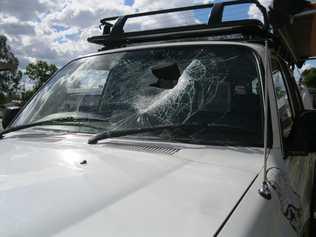 A family narrowly escaped seriously injury after a brick fell from a truck, bounced off the road and shattered two windscreens on the Warrego Highway near Miles on Thursday. Picture: QPS