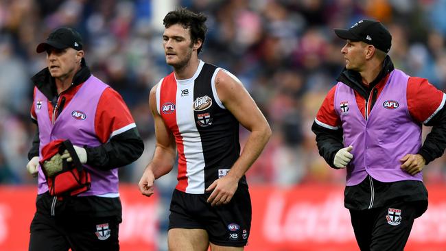 Dylan Roberton jogs from the field.