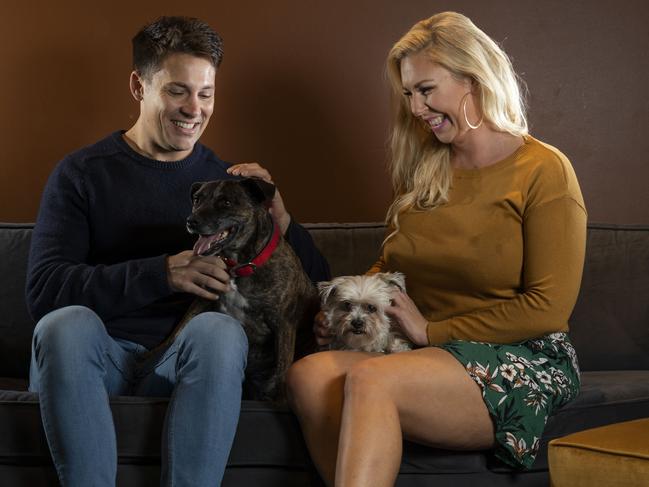 Dating with Dogs organiser Tatum Brown with Anthony Butler and dogs, Rosie and Chloe. Photo: AAP/Matthew Vasilescu