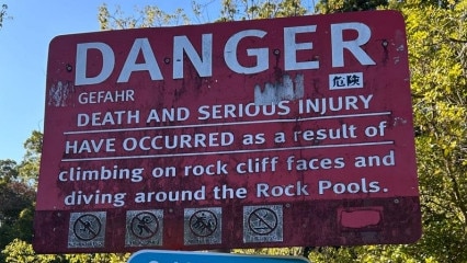 Safety signage at the Currumbin Rock Pools.