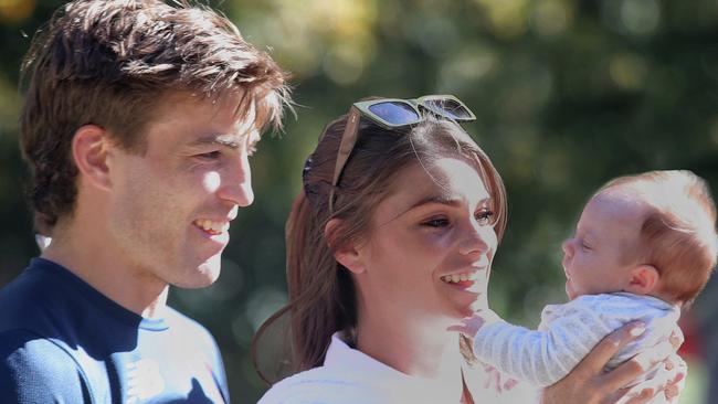 Charlotte and Jack Viney with baby Mila. Picture: Matthew Goodrope