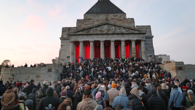 An estimated 30,000 people, the largest crowd ever seen, gathered at the Shrine of Remembrance on a picturesque morning in Victorian capital. Picture: David Crosling
