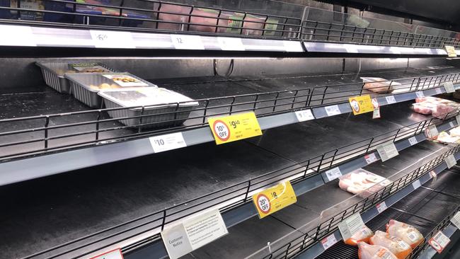 Bare shelves in a Melbourne supermarket last month. Picture: David Crosling