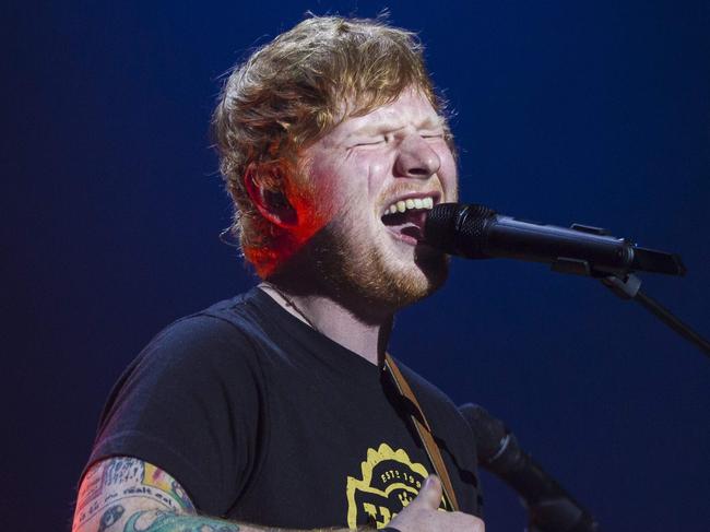 British singer-songwriter Ed Sheeran performs during a concert at the Ziggo Dome in Amsterdam on April 3, 2017.  / AFP PHOTO / ANP / Paul Bergen / Netherlands OUT