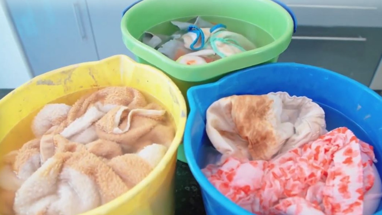 Kelly, who was busy attending to her newborn at the time, would often leave dirty clothes and nappies soaking in the bucket for up to a week. Picture: Supplied