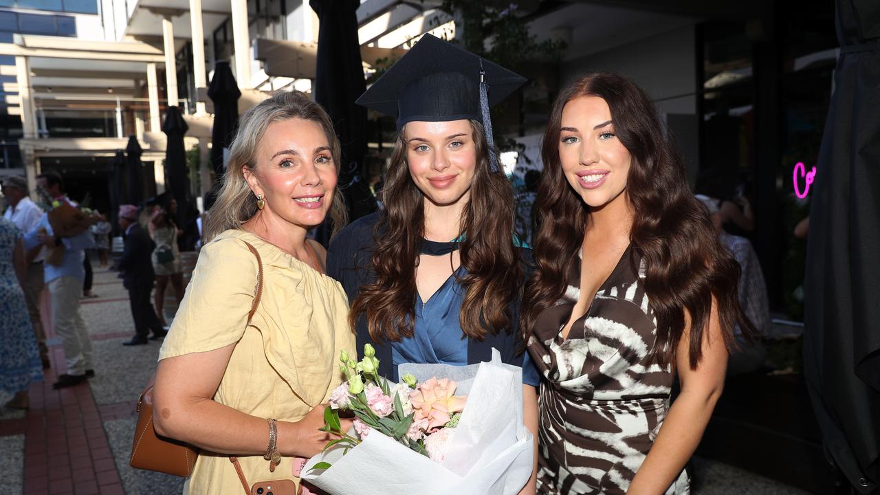 Julia Gonzalez, graduate Tiffany Gonzalez, and Keeley Marchesi. Picture: Alan Barber