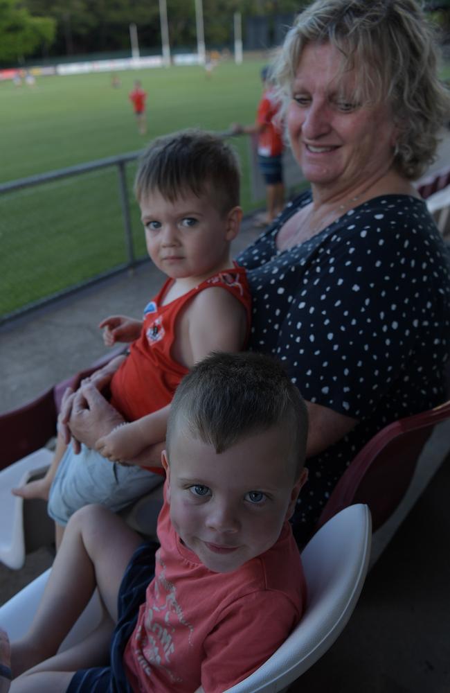 Grandma Rosemary Rowley with grandsons Tate and Ralph Rowley at the opening game of the NTFL 22/23 season. Picture: (A)manda Parkinson