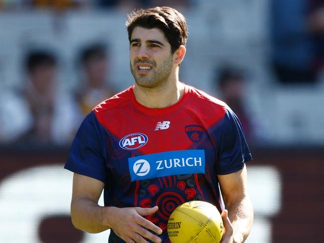 MELBOURNE, AUSTRALIA - MARCH 23: Christian Petracca of the Demons warms up during the 2024 AFL Round 02 match between the Hawthorn Hawks and the Melbourne Demons at the Melbourne Cricket Ground on March 23, 2024 in Melbourne, Australia. (Photo by Michael Willson/AFL Photos via Getty Images)