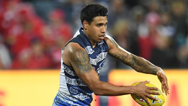 Tim Kelly’s rise has given Geelong a formidable midfield mix. Picture: AAP Image/Julian Smith.