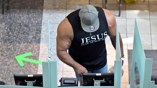 Alex Alba of Nevada casts his ballot at a polling station inside the Galleria at Sunset mall on in Las Vegas, Nevada.