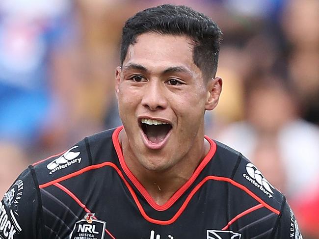 Captain Roger Tuivasa-Sheck of the Warriors celebrates scoring a try during the Round 2 NRL match between the Warriors and the Gold Coast Titans at Mount Smart Stadium in Auckland, New Zealand, Saturday, March 17, 2018. (AAP Image/David Rowland) NO ARCHIVING, EDITORIAL USE ONLY