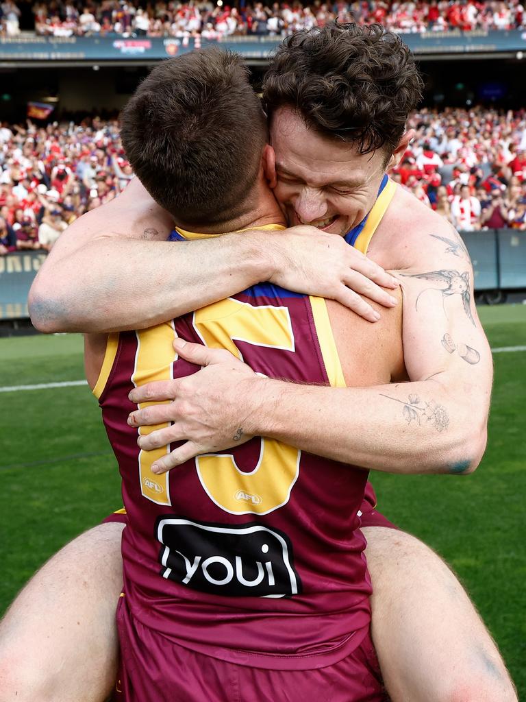 Lachy Neale embraces Dayne Zorko post-match. Picture: Michael Willson/AFL Photos via Getty Images