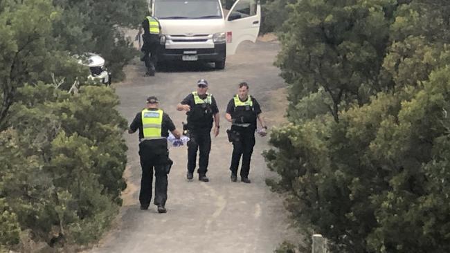 Police investigate after a teenager discovered the body of Simon Gaskill in the bushes near the Ocean Grove surf beach. Picture: Mandy Squires