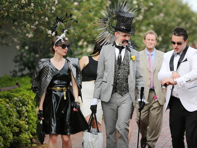 What time's that last train? Racegoers make their way to trains for the return to the city after Melbourne Cup Day 2014 at Flemington Racecourse. Picture: Nathan Dyer