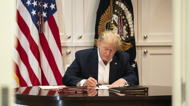 Donald Trump at work in the Presidential Suite at Walter Reed National Military Medical Center in Bethesda, Maryland. Picture: The White House