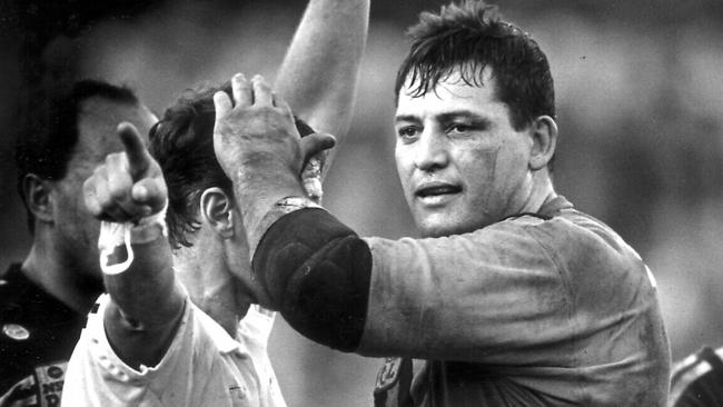 Steve Roach copped five minutes in the sin bin, a $5000 fine and a four-game suspension for this pat on the head of referee Eddie Ward during a Balmain v Manly game in 1990.