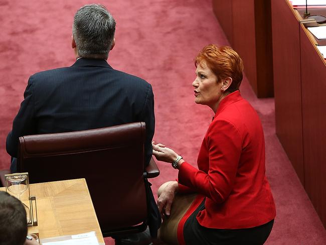 Pauline Hanson speaks with Mathias Cormann yesterday. Picture: Kym Smith