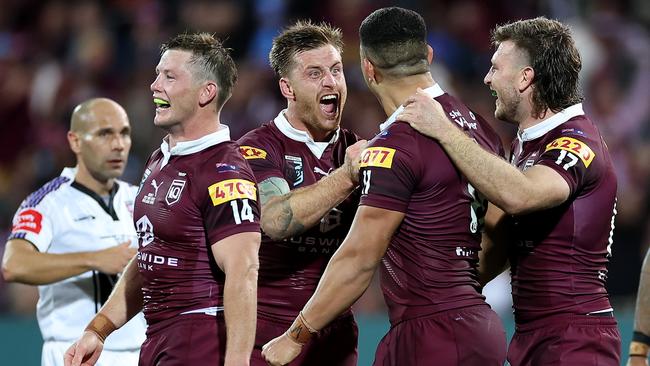 ADELAIDE, AUSTRALIA - MAY 31:  Cameron Munster of the Maroons celebrates with team mates during game one of the 2023 State of Origin series between the Queensland Maroons and New South Wales Blues at Adelaide Oval on May 31, 2023 in Adelaide, Australia. (Photo by Cameron Spencer/Getty Images)