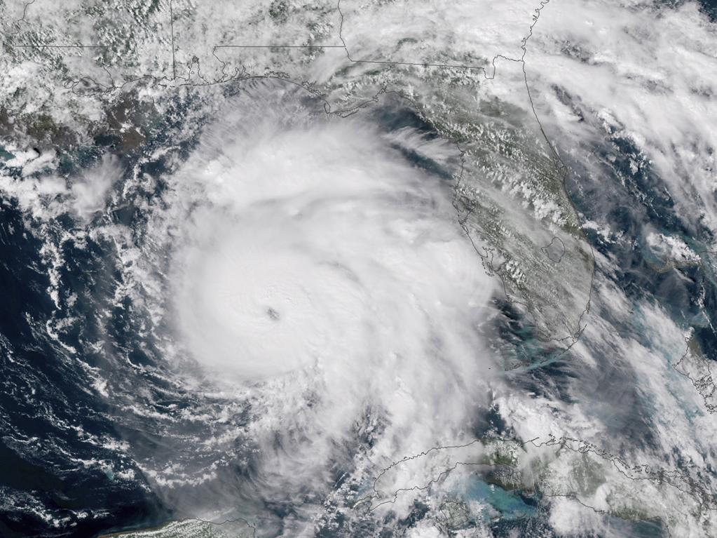 This satellite image shows Hurricane Michael, centre, in the Gulf of Mexico. Picture: NOAA via AP