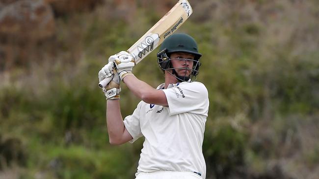 Nathan Johnson hits a massive six for St Bernard’s. Picture: Andrew Batsch