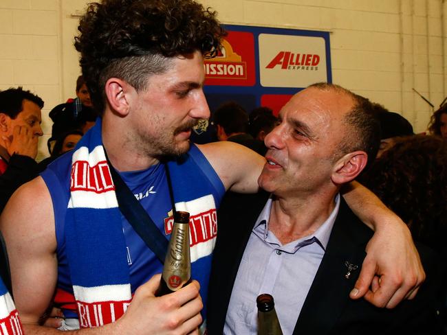 Proud dad Tony Liberatore with son Tom after the Western Bulldogs defeated Sydney in last year’s Grand Final. Picture: Getty Images