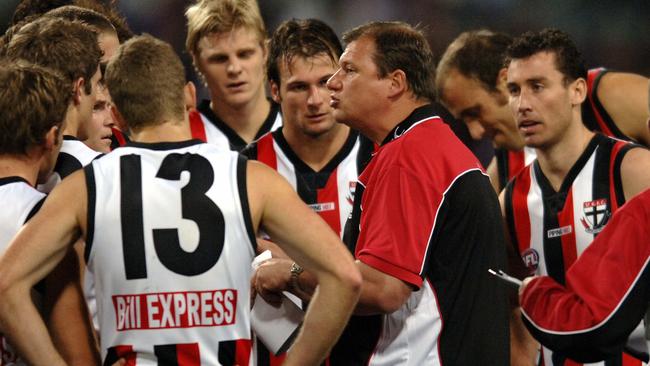 Coach Grant Thomas chatting with his players at Subiaco